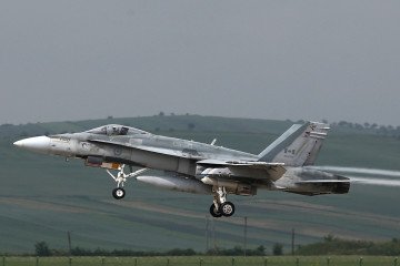 A fighter type F-18 Hornet of Canadian Royal Air Force takes off from the military airbase at Campia Turzii, on May 28, 2014. Illustrative photo. (Source: Getty Images)