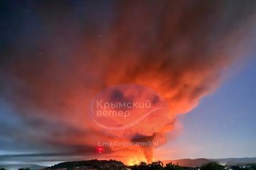 A massive fire and thick smoke rise over a facility in temporarily occupied Crimea following a reported overnight strike. (Source: Crimean Wind/Telegram)
