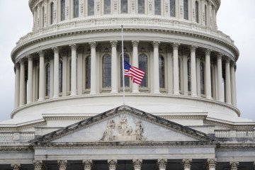 A US flag flies at half-staff over the US Capitol following the death of Senator Lindsey Graham in Washington, DC, on July 12, 2026. (Source: Getty Images)