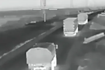 Russian military trucks travel along the Mariupol–Crimea highway before reportedly being targeted by Ukrainian drones. (Source: 412th Nemesis Brigade)