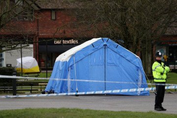 A bench covered in a protective tent is pictured at The Maltings shopping centre in Salisbury, southern England, on March 15, 2018, amid Novichok poisonings. (Source: Getty Images)