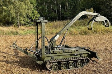 A Terrikon-X robotic engineering vehicle developed by Ukrainian company IXIAN, equipped with a manipulator arm for debris removal and recovery missions. (Source: IXIAN)