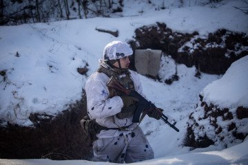 A Ukrainian soldier takes part in trench assault training exercises in the Sumy region on January 19, 2026. (Source: Getty Images)