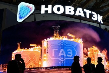 Participants gather in front of the stand of Russia's liquefied natural gas producer Novatek at the Russian Energy Week forum in Moscow on October 16, 2025 Participants gather in front of the stand of Russia's liquefied natural gas producer Novatek at the Russian Energy Week forum in Moscow on October 16, 2025