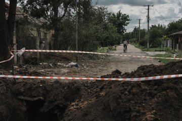 A crater from the explosion remains in the ground after the Russian attack on July 23, 2026 in Shevchenkove, Kharkiv region. Illustrative photo. (Source: Getty Images)