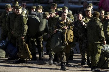 Russian citizens drafted during the partial mobilization are seen being dispatched to combat coordination areas after a military call-up for the Russia-Ukraine war in Moscow, Russia. (Source: Getty Images)