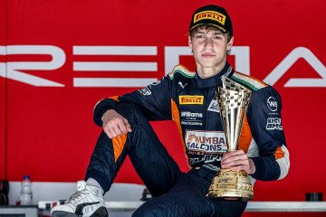 Sixteen-year-old Ukrainian driver Oleksandr Bondarev holds the 2026 UAE4 Series Drivers’ Champion trophy. (Source: Oleksandr Bondarev/Instagram)