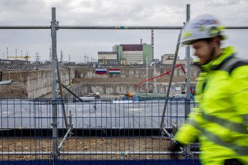 Workers prepare reactor unit No. 5 during the first concrete pouring ceremony at Hungary’s Russian-led Paks II nuclear power plant project, February 2026. (Source: Getty Images)