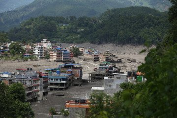 A flood-damaged section of a highway in Nuwakot, Central Nepal, following the outburst of a glacial lake in Tibet on August 26, 2026. (Source: Getty Images)