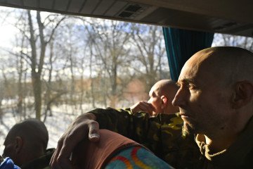 How Moscow Coerces Ukrainian Families Using Captive Relatives Ukrainian prisoners of war arrive by bus after captivity on March 5, 2026 in Chernihiv Oblast, Ukraine. Illustrative image. (Source: Getty Images)