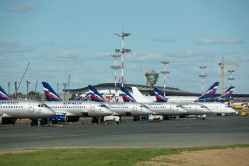 Multiple Sukhoi Superjet 100-95 passenger jets, operated by Aeroflot-Russian Airlines PJSC, stand on the tarmac at Sheremetyevo International Airport OAO in Moscow, Russia, on June 1, 2018. (Source: Getty Images)