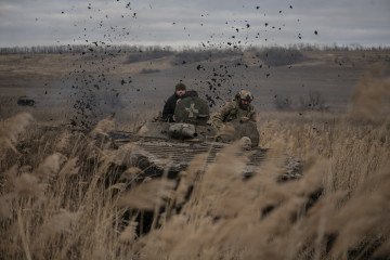 Ukrainian military drive on an armored vehicle during military exercises on December 28, 2023, in the Donetsk region, Ukraine. (Source: Getty Images) Ukrainian military drive on an armored vehicle during military exercises on December 28, 2023, in the Donetsk region, Ukraine. (Source: Getty Images)