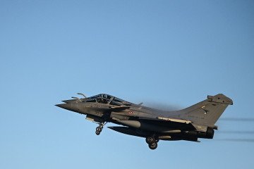 French Rafale fighter jets fly over Mont-de-Marsan Air Base during the Garuda 2025 French–Indian military exercise in southwestern France, November 26, 2025. (Source: Getty Images)