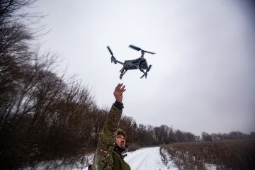 Ukrainian army soldiers release a reconnaissance drone on the Sumy front, in Sumy, Ukraine, on January 28, 2026. (Source: Getty Images)