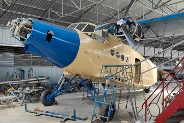 Modified Soviet-era Antonov An-2 aircraft fitted with a three-engine configuration during modernization work in Russia. (Source: Russian media)