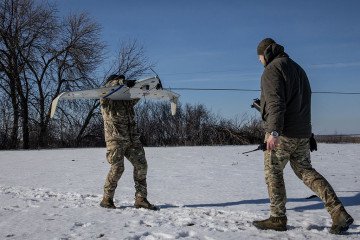 Members of “Taifun” special operations unit of unmanned systems of the National Guard of Ukraine prepare to launch a reconnaissance drone on February 27, 2026 in Kharkiv Region, Ukraine. (Source: Getty Images)
