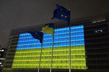 A view of the European Commission building and the Council of the European Union building, illuminated in the colors of the Ukrainian flag. (Source: Getty Images)