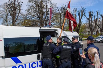 Valentins Jeremejevs, former member of the Latvian Green Party, is detained by the police next to the Freedom Monument in Riga, Latvia, on May 1, 2020. Illustrative photo. (Source: Getty Images)