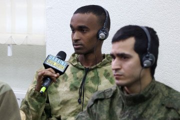 A man from Somalia made a prisoner of war (POW) after being captured by Ukraine as a foreign combatant within the Russian armed forces, speaks during a press conference organized by Ukrainian officials in Kyiv, on March 15, 2024. (Source: Getty Images) A man from Somalia made a prisoner of war (POW) after being captured by Ukraine as a foreign combatant within the Russian armed forces, speaks during a press conference organized by Ukrainian officials in Kyiv, on March 15, 2024. (Source: Getty Images)