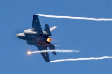 An Israeli F-35 fighter jet performs during an air show over the beach in the Mediterranean coastal city of Tel Aviv, on May 9, 2019. (Source: Getty Images)