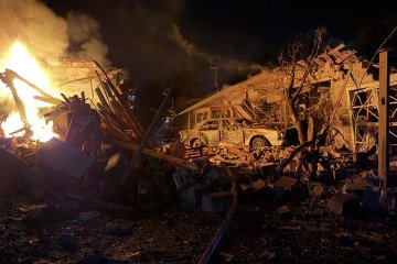 A Ukrainian rescuer works at the site of a Russian strike in Zaporizhzhia on August 11, 2026. A Ukrainian rescuer works at the site of a Russian strike in Zaporizhzhia on August 11, 2026.