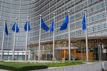 Flags of the European Union fly outside the EU headquarters in Brussels, Belgium, on December 19, 2025. (Source: Getty Images)