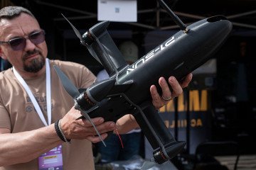 A man examines a Ukrainian-made P1-Sun interceptor drone during the career festival on May 21, 2026 in Kyiv, Ukraine. (Source: Getty Images) A man examines a Ukrainian-made P1-Sun interceptor drone during the career festival on May 21, 2026 in Kyiv, Ukraine. (Source: Getty Images)