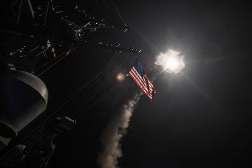 The guided-missile destroyer USS Porter fires a Tomahawk land attack missile on April 7, 2017, in the Mediterranean Sea. (Source: Getty Images) The guided-missile destroyer USS Porter fires a Tomahawk land attack missile on April 7, 2017, in the Mediterranean Sea. (Source: Getty Images)