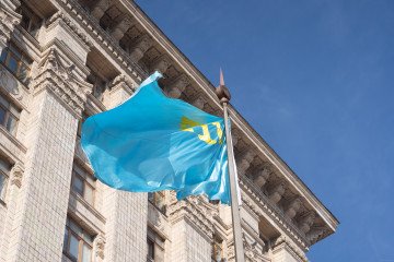 Illustrative image. Flag of the Crimean Tatar waves next to the City State Administration on February 26, 2025, in Kyiv, Ukraine. (Source: Getty Images)