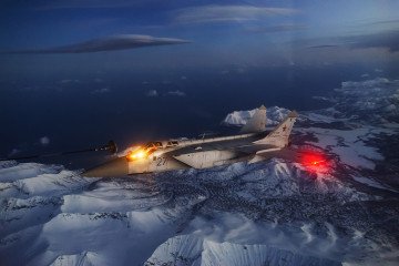 Russian MiG-31K from the Russian Pacific Fleet aviation refueling above Kamchatka during military drills. (Source: Wikimedia)