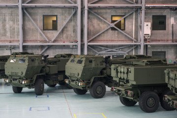 HIMARS rocket launchers are seen placed on military vehicles at the military 1st Transport Aviation Base in Warsaw on May 15, 2023. (Source: Getty Images)
