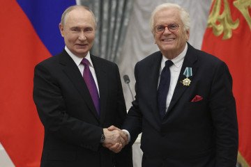 Russian leader Vladimir Putin presents German conductor Justus Frantz with the Order of Friendship during a National Unity Day ceremony at the Kremlin, Moscow, November 4, 2025. (Source: Getty Images)