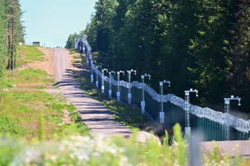 A border fence stands along the Finnish-Russian border at a closed border crossing, July 16, 2026, Finland, Virolahti. A border fence stands along the Finnish-Russian border at a closed border crossing, July 16, 2026, Finland, Virolahti.