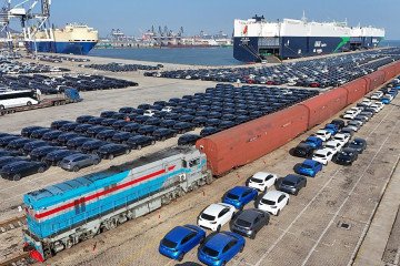Chinese-made automobiles are transported by railway to the Yantai Port for assembly and wait to be loaded onto ships for export in Yantai City, Shandong Province, China, on January 28, 2026. (Photo by Costfoto/NurPhoto via Getty Images)