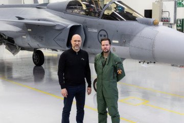 Ukrainian Defense Minister Denys Shmyhal stands beside a Swedish JAS 39 Gripen fighter jet. (Source: Denys Shmyhal )