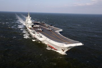 China’s Liaoning aircraft carrier sails during military exercises in the Pacific Ocean on December 24, 2016. (Source: Getty Images) China’s Liaoning aircraft carrier sails during military exercises in the Pacific Ocean on December 24, 2016. (Source: Getty Images)