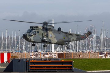 Retired German Sea King Mk41 helicopter flies over a UK airfield as part of preparation for transfer to Ukraine, April 2026. (Source: Portland HeliOperations Supporters)