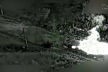 A Russian BM-27 Uragan multiple-launch rocket system burns after being struck by a Lasar’s Group drone. (Source: Lasar’s Group)