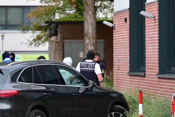 Two suspects in the arson attack on a Starlink ground station in Poland are escorted to court in Nürtingen, Germany, on October 13, 2026. (Source: Getty Images) Two suspects in the arson attack on a Starlink ground station in Poland are escorted to court in Nürtingen, Germany, on October 13, 2026. (Source: Getty Images)