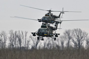 Ukrainian Mi-8 military helicopters fly at low altitude in the Kharkiv region on April 2, 2023. (Source: Getty Images) Ukrainian Mi-8 military helicopters fly at low altitude in the Kharkiv region on April 2, 2023. (Source: Getty Images)