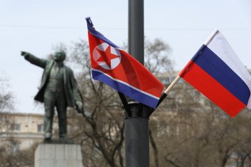 North Korean and Russian flags displayed at Vladivostok railway station during Kim Jong Un’s visit to Russia, April 26, 2019. (Source: Getty Images)