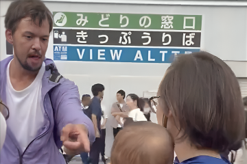 A Russian Harasses Peaceful Ukraine Supporters in Tokyo, Flashes Nazi Salute