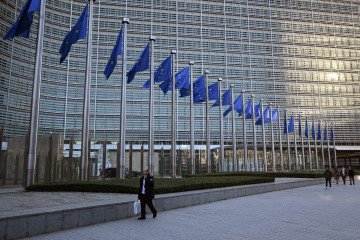 This photograph shows an outside view of the Berlaymont building, the European Union Commission headquarters, in Brussels on December 15, 2025. (Source: Getty Images)