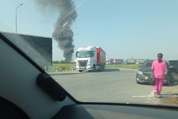 Smoke rises near a Wildberries logistics center in Yekaterinburg following a reported drone attack on July 25, 2026. (Photo: Open source)
