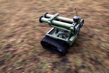 A weapon is mounted on the Lehit ground robotic system, developed by specialists of the International Legion under the Defence Intelligence of Ukraine, during a demonstration in Ukraine on December 9, 2025. (Source: Getty Images)