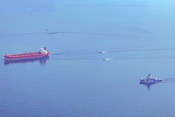An aerial view of the Swedish Coast Guard intercepting the Jin Hui near Trelleborg. Authorities boarded the suspected Russian shadow fleet vessel and arrested its commander. (Source: Minister of Civil Defence Carl-Oskar Bohlin)