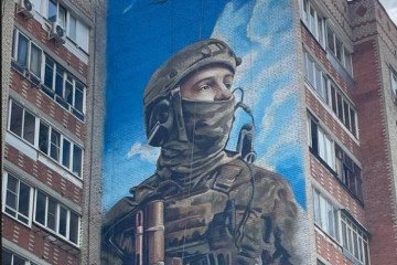 Russia Accidentally Spends $20K Painting Ukrainian Azov Recruitment Campaign on Victory Day Mural