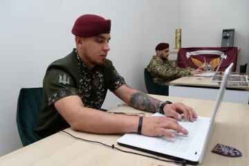 Soldiers work inside the 80th Brigade's recruiting center on June 13, 2025, in Lviv, Ukraine. Soldiers work inside the 80th Brigade's recruiting center on June 13, 2025, in Lviv, Ukraine.