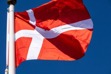 The Danish flag flies in connection with the celebration to mark the Øresund Bridge's 25th anniversary at Luftkastellet. (Source: Getty Images)
