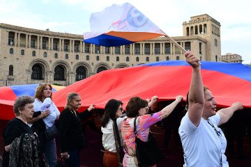 Supporters of Strong Armenia, the party of billionaire Russian-Armenian businessman Samvel Karapetyan, who is under house arrest on charges of plotting a coup, stage a campaign rally in central Yerevan on June 3, 2026. (Source: Getty Images)